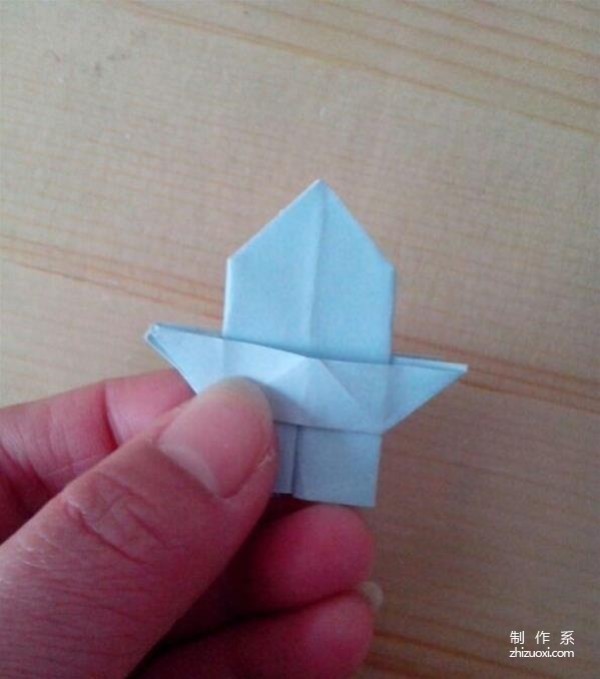 Illustrated tutorial on how to make origami Lei Feng Tower as a child