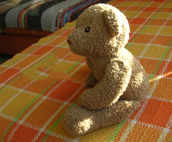 Cute brown plush teddy bear made from handmade DIY fabric