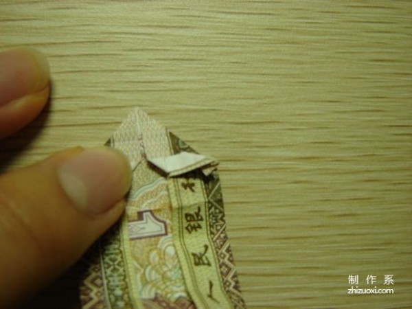 Illustrated tutorial for DIY handmade origami camera toys using RMB or US dollar banknotes