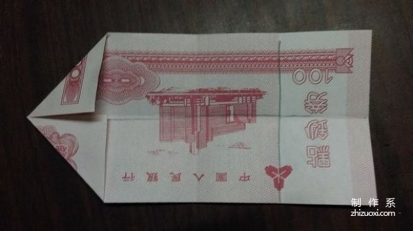 Illustrated tutorial on how to make origami paper money five-petal lotus