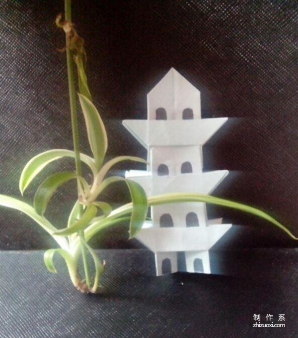 Illustrated tutorial on how to make origami Lei Feng Tower as a child