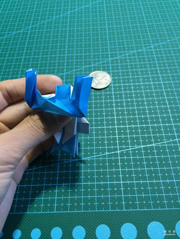 Real-life tutorial on origami Chirulian with complex origami cartoon characters