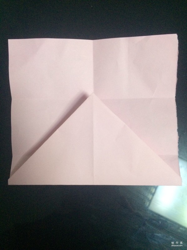 Very simple origami illustration of colored paper five-pointed star