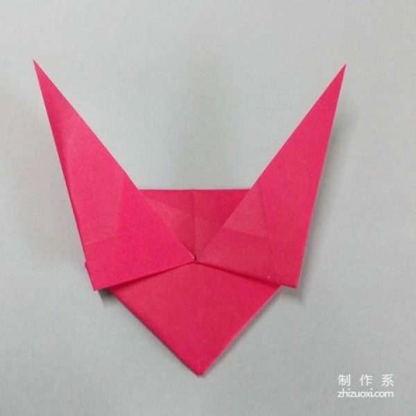 Tutorial on how to make handmade origami hearts with wings