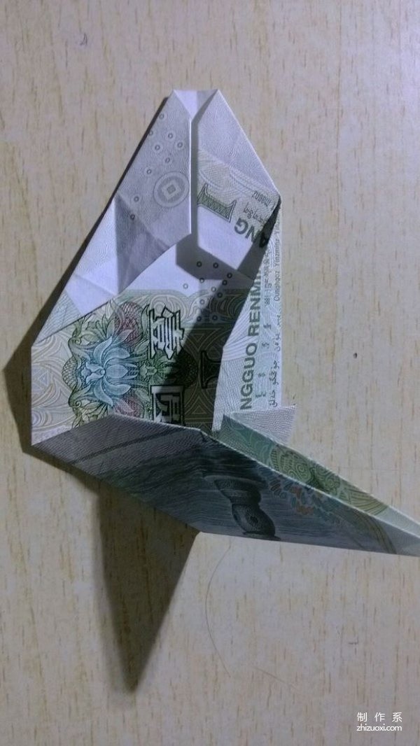 Illustrated tutorial on folding a hexagon using one-yuan banknotes