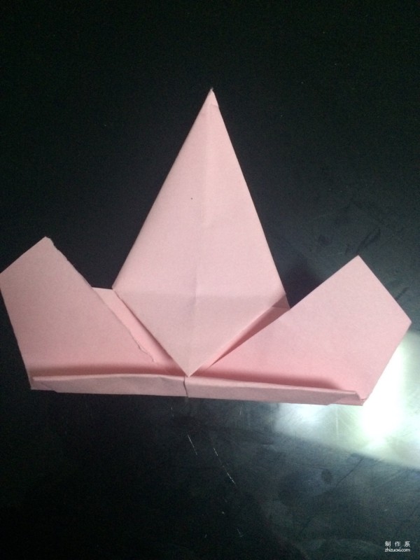 Very simple origami illustration of colored paper five-pointed star