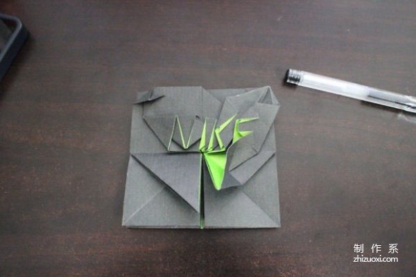 A very creative graphic tutorial on origami Nike logo