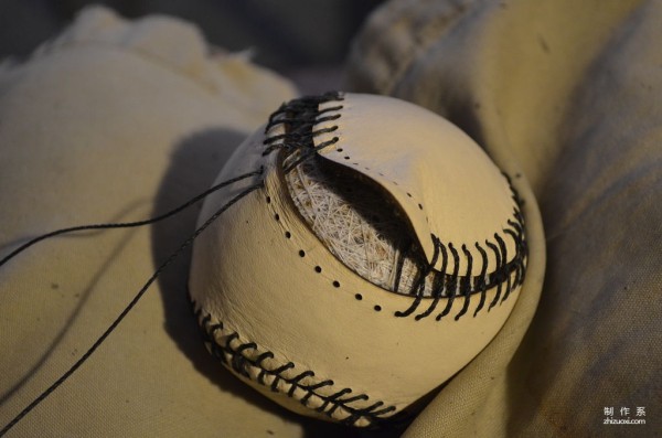 Sew a baseball, it seems pretty simple