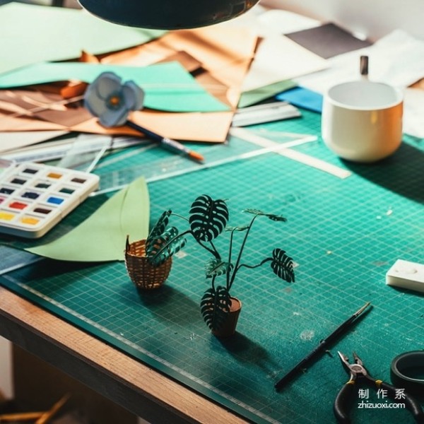 A very delicate paper potted plant, a relatively realistic-looking origami art tutorial