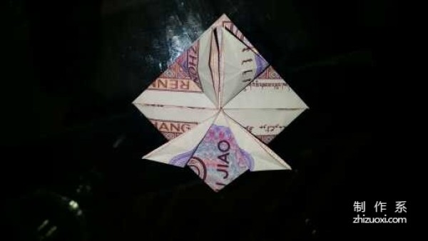 Tutorial on how to fold the little frog using five cents RMB