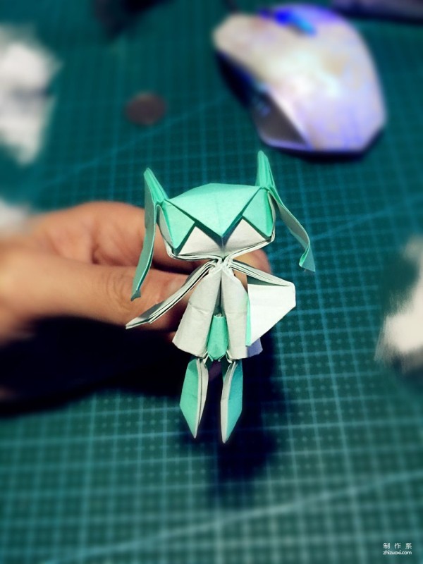 Real-life tutorial on origami Chirulian with complex origami cartoon characters