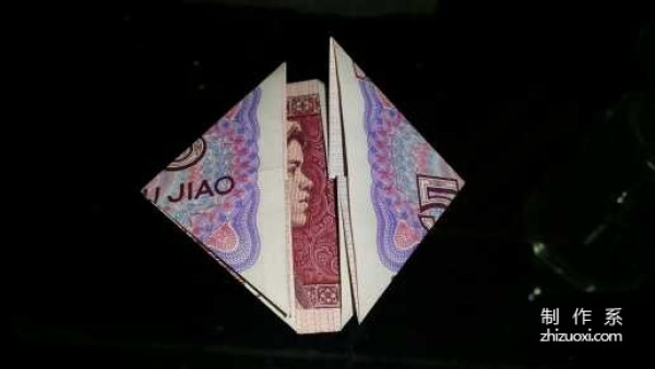 Tutorial on how to fold the little frog using five cents RMB