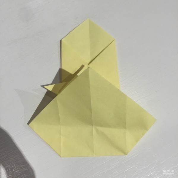 Detailed step-by-step illustration of creative origami for chicken red envelope