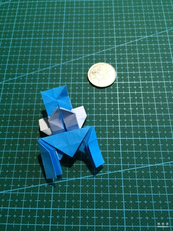 Real-life tutorial on origami Chirulian with complex origami cartoon characters