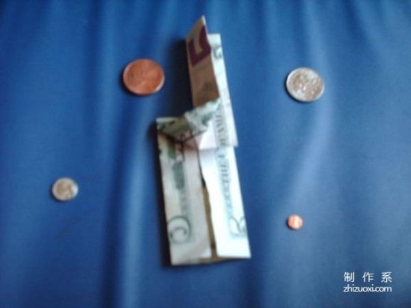 How to make an origami guitar out of dollars Tutorial on how to make an origami guitar out of dollars