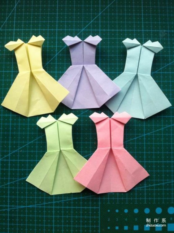 Simple origami illustrated tutorial for making a cute little girl’s skirt