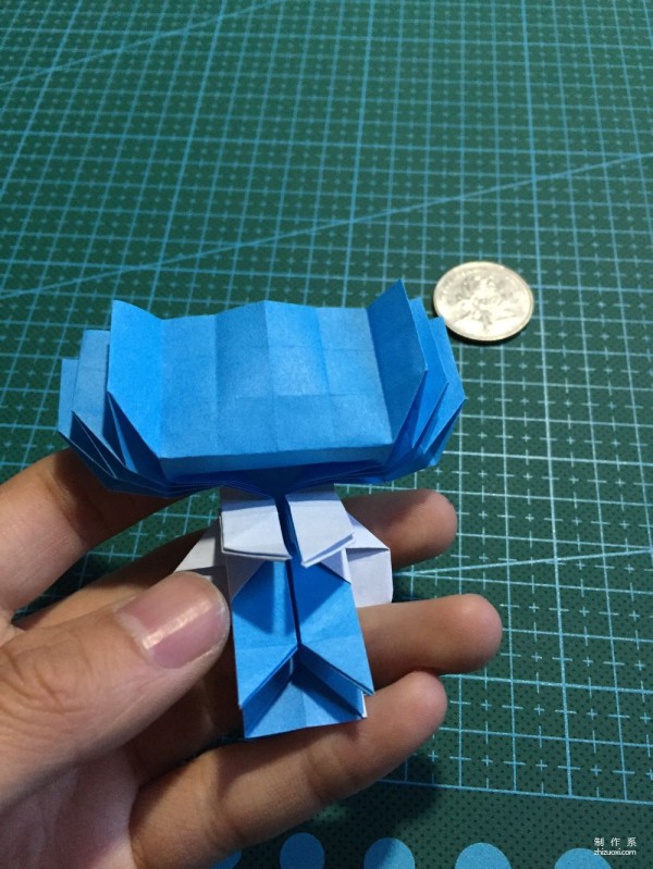 Real-life tutorial on origami Chirulian with complex origami cartoon characters