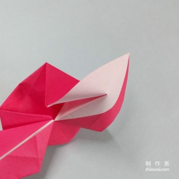 Tutorial on how to make handmade origami hearts with wings