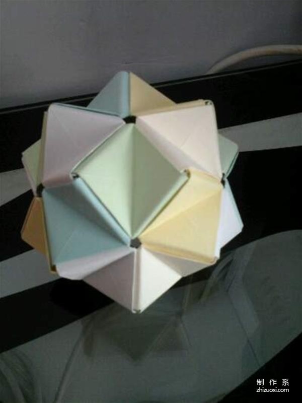 Fold small paper balls from colored paper, origami method of paper flower balls