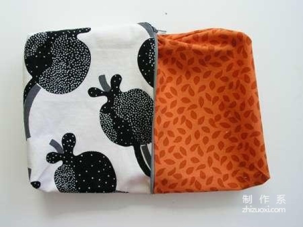 Handmade fabric art teaches you how to make a simple and practical zipper bag from scrap cloth