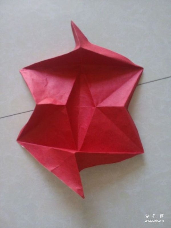 Illustrated origami tutorial for folding a three-dimensional little fox