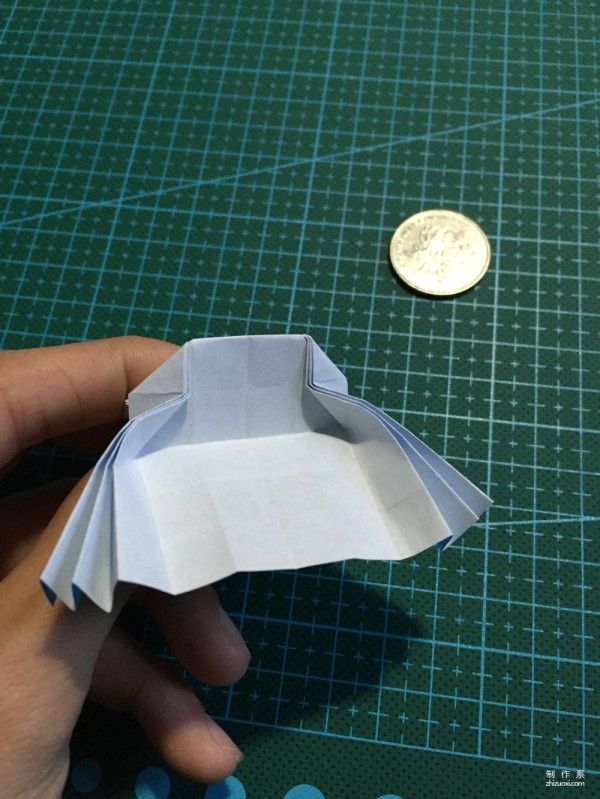 Real-life tutorial on origami Chirulian with complex origami cartoon characters