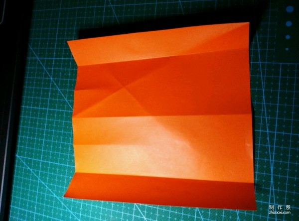 Origami method of folding a paper bird, real-life tutorial on origami of a small kingfisher