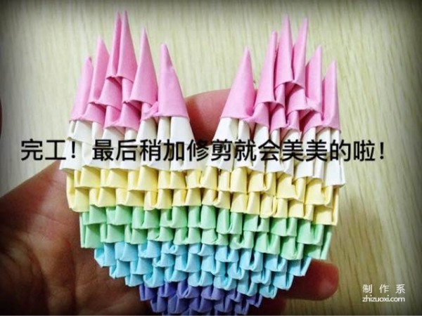 Insert a rainbow heart into a triangle, a tutorial on how to make a beautiful love using origami using a triangle