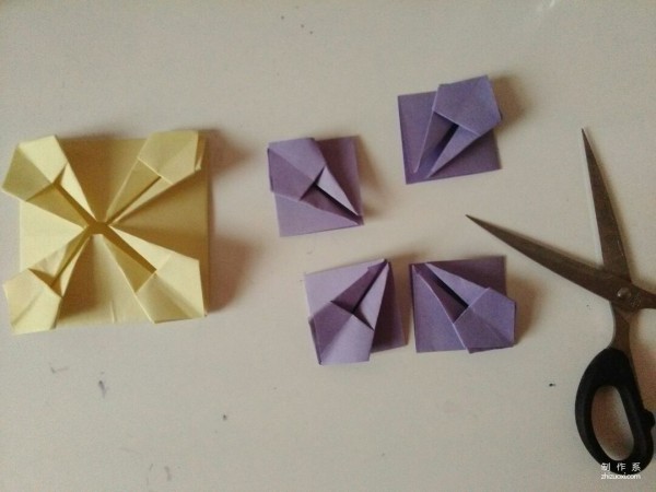 Very simple origami tutorial with beautiful blue paper flowers.