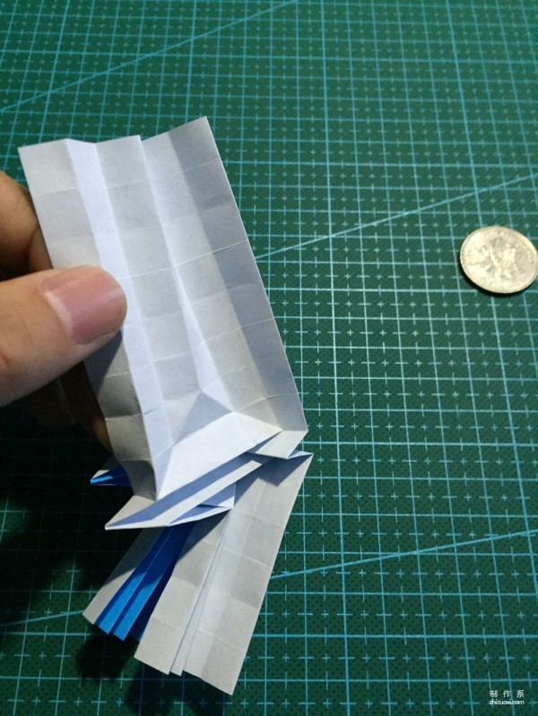 Real-life tutorial on origami Chirulian with complex origami cartoon characters