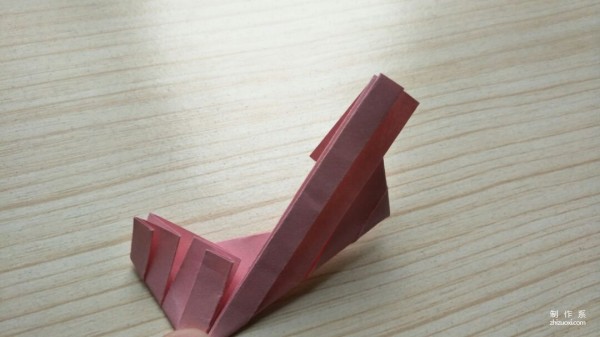 Illustration of how to make simple origami hollow squares for children