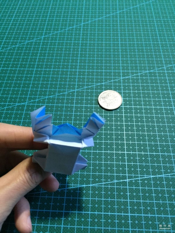 Real-life tutorial on origami Chirulian with complex origami cartoon characters