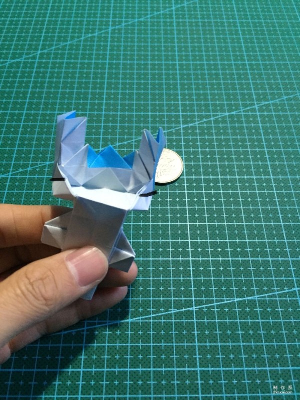 Real-life tutorial on origami Chirulian with complex origami cartoon characters