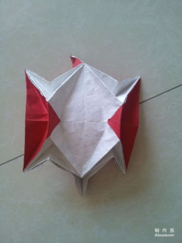 Illustrated origami tutorial for folding a three-dimensional little fox