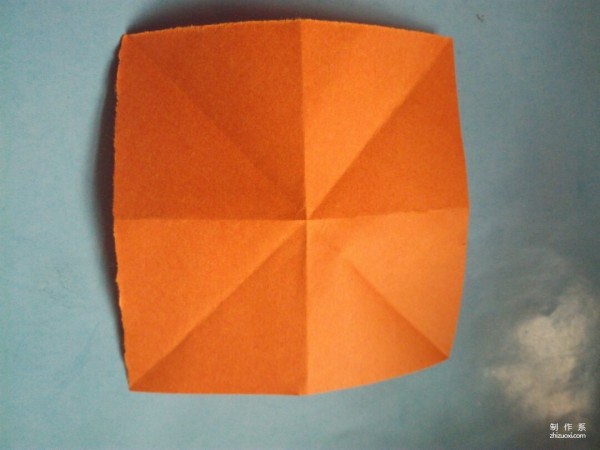 Simple hand-made origami method for children to make a three-dimensional hexagonal star