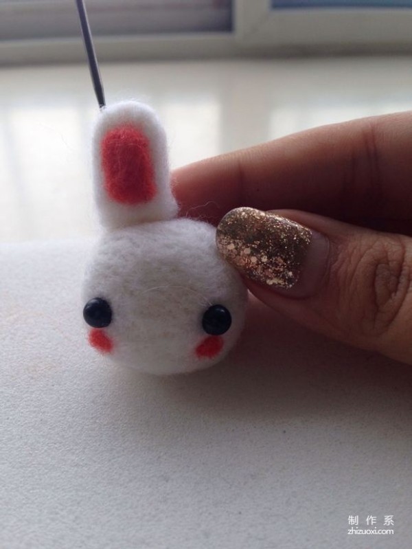 Handmade illustration of cute wool felt bunny pendant