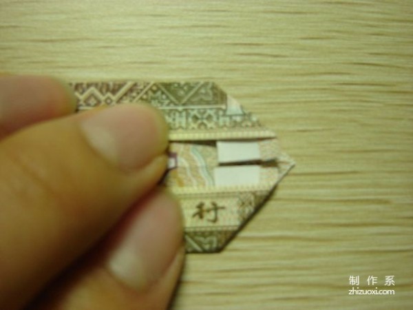 Illustrated tutorial for DIY handmade origami camera toys using RMB or US dollar banknotes