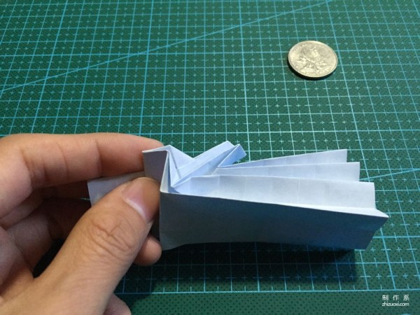 Real-life tutorial on origami Chirulian with complex origami cartoon characters